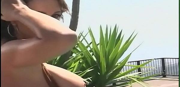  Exotic sultry minx with nice boobs sucks two cocks the gets double penetrated at the perfect place near by the pool